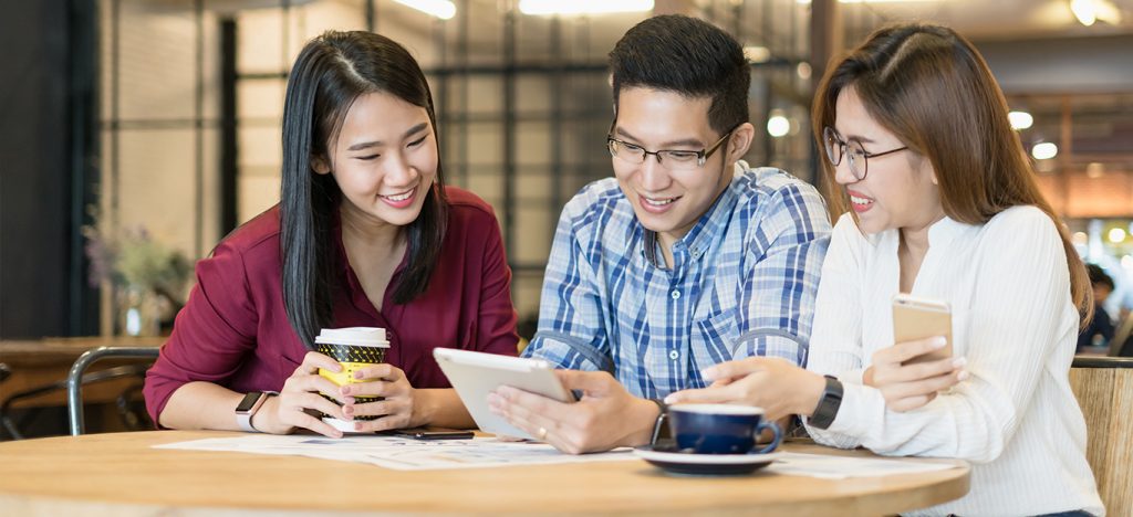 People browsing on a tablet banner